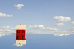 Little Red House Symbol On Mirror Stock Image Little Red House Symbol On Mirror Stock Image