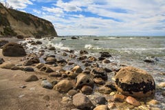 Littoral rocheux dans la baie de l'abondance, Nouvelle-Zélande photographie stock libre de droits Littoral rocheux dans la baie de l'abondance, Nouvelle-Zélande photographie stock libre de droits
