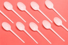 Living coral concept plastic spoons pattern flat lay royalty free stock images Living coral concept plastic spoons pattern flat lay royalty free stock images