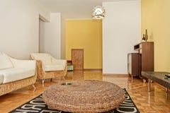 Luxury Brown Living Room With Hardwood Floors. Stock Image - Image of