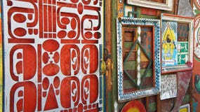 Ljubljana, Slovenia - 07/19/2015 - Part of art wall in Metelkova, artistic district with colored buildings, graffitti, sculptures stock photos Ljubljana, Slovenia - 07/19/2015 - Part of art wall in Metelkova, artistic district with colored buildings, graffitti, sculptures stock photos