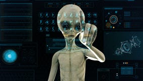 Lo straniero preme i tasti sullo schermo dell'ologramma di fantascienza Fondo realistico di moto 4K Lo straniero preme i tasti sullo schermo dell'ologramma di fantascienza Fondo realistico di moto 4K