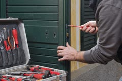 Locksmith Repair The Door Lock Royalty Free Stock Photo Locksmith Repair The Door Lock Royalty Free Stock Photo