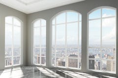 Loft el interior con las ventanas grandes y la opinión de la ciudad imagen de archivo Loft el interior con las ventanas grandes y la opinión de la ciudad imagen de archivo