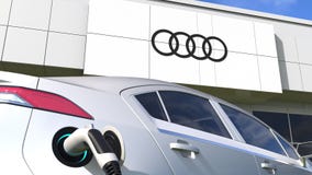 AUDI Logo and the Electric Car Plug. Editorial Conceptual 3d Animation  Stock Video - Video of dealership, technical: 227270403