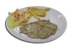 Lokalisiertes Schweinefleischsteak mit Pommes-Frites und Salat auf einem weißen Hintergrund mit Beschneidungspfad lizenzfreie stockbilder Lokalisiertes Schweinefleischsteak mit Pommes-Frites und Salat auf einem weißen Hintergrund mit Beschneidungspfad lizenzfreie stockbilder