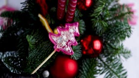 Lollipop in the form of Christmas trees - rattle pink shake from side to side, inside the balls are moving on the