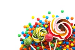 Lollys en kleurrijk suikergoed op witte achtergrond stock afbeelding Lollys en kleurrijk suikergoed op witte achtergrond stock afbeelding