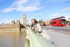 London travel woman tourist by Big Ben and red bus stock image London travel woman tourist by Big Ben and red bus stock image