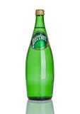 LONDON, UK - DECEMBER 06, 2016: Bottle of Perrier sparkling water. Perrier is a French brand of natural bottled mineral water sold Stock Image LONDON, UK - DECEMBER 06, 2016: Bottle of Perrier sparkling water. Perrier is a French brand of natural bottled mineral water sold Stock Image