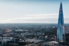 Londra e coccio, il più alta costruzione nella città immagine stock libera da diritti Londra e coccio, il più alta costruzione nella città immagine stock libera da diritti