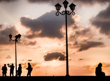 Loneliness Silhouette conceptual shot and sunset stock photo Loneliness Silhouette conceptual shot and sunset stock photo