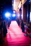 Long red carpet between rope barriers on entrance. Red Carpet Fashion Awards is a celebrity fashion website which chronicles the ensembles from runways and red royalty free stock photos Long red carpet between rope barriers on entrance. Red Carpet Fashion Awards is a celebrity fashion website which chronicles the ensembles from runways and red royalty free stock photos