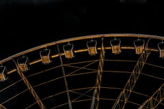 Looking up at the enclosed cars on a giant ferris wheel at night royalty free stock images Looking up at the enclosed cars on a giant ferris wheel at night royalty free stock images
