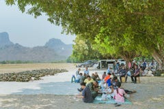 LOPBURI THAILAND, MARCH 23, 2019 : Thai cadets relax after completing the parachute training at Ban Tha Duea Drop Zone on March 23 stock photo LOPBURI THAILAND, MARCH 23, 2019 : Thai cadets relax after completing the parachute training at Ban Tha Duea Drop Zone on March 23 stock photo