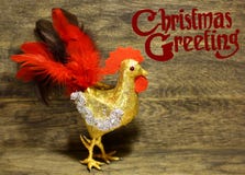 Los saludos adornados de la Navidad del texto diseñan la tarjeta de la enhorabuena del invierno Foto de archivo Los saludos adornados de la Navidad del texto diseñan la tarjeta de la enhorabuena del invierno Foto de archivo