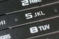 Los viejos números y los dígitos de teléfono móvil se cierran para arriba imagen de archivo Los viejos números y los dígitos de teléfono móvil se cierran para arriba imagen de archivo