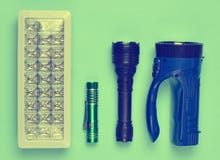 Lots of flashlights on a blue background, top view. royalty free stock photos Lots of flashlights on a blue background, top view. royalty free stock photos