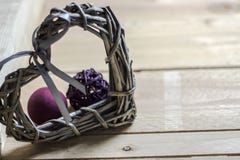 Wicker heart on a wooden background. stock image Wicker heart on a wooden background. stock image