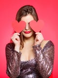 Love from first sight. Woman in stylish dress hold symbol love. Romantic mood. Girl in love dating. Obsession concept royalty free stock image Love from first sight. Woman in stylish dress hold symbol love. Romantic mood. Girl in love dating. Obsession concept royalty free stock image