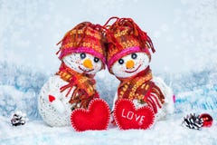 Love snowmen. Snowfall. Love concept. Greeting card Happy Valentines day royalty free stock photo Love snowmen. Snowfall. Love concept. Greeting card Happy Valentines day royalty free stock photo