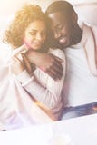 Portrait of happy couple while looking downwards stock image Portrait of happy couple while looking downwards stock image