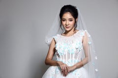 https://thumbs.dreamstime.com/t/lovely-asian-beautiful-woman-bride-white-wedding-gown-dress-w-portrait-head-shot-lace-black-hair-studio-lighting-grey-98407359.jpg