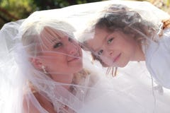 Lovely Bride And Little Girl Stock Photo