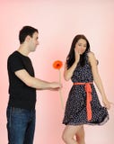 Lovely Romantic Man Giving Flower To A Woman Stock Images
