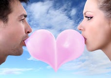 Lovers couple kiss heart shaped valentine day with chewing gum royalty free stock photos Lovers couple kiss heart shaped valentine day with chewing gum royalty free stock photos