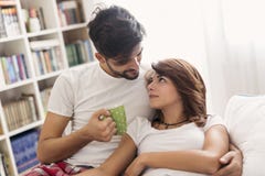 Loving couple cuddling after waking up stock images Loving couple cuddling after waking up stock images