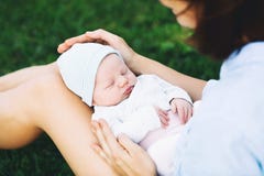 Loving mother with her newborn baby on her arms. Stock Photography Loving mother with her newborn baby on her arms. Stock Photography