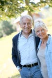 Loving senior couple outdoors walking royalty free stock image Loving senior couple outdoors walking royalty free stock image