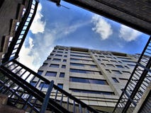Low-angle Photography of High Rise Building Under Stratus Clouds Stock Photos Low-angle Photography of High Rise Building Under Stratus Clouds Stock Photos
