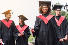 Joyful students celebrating their graduation from university royalty free stock image Joyful students celebrating their graduation from university royalty free stock image
