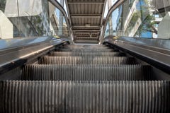 Low angle view looking to top of modern escalator stock photography Low angle view looking to top of modern escalator stock photography