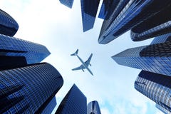 Low angle view of skyscrapers. Skyscrapers at sunset looking up perspective. Bottom view of modern skyscrapers in royalty free stock photography Low angle view of skyscrapers. Skyscrapers at sunset looking up perspective. Bottom view of modern skyscrapers in royalty free stock photography
