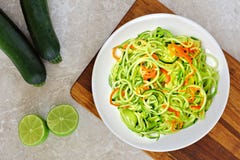 Low carb zucchini noodles on white marble Royalty Free Stock Photography Low carb zucchini noodles on white marble Royalty Free Stock Photography