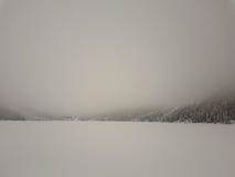 Low visibility conditions due to a fog in Tatry in Poland at winter time royalty free stock photography Low visibility conditions due to a fog in Tatry in Poland at winter time royalty free stock photography