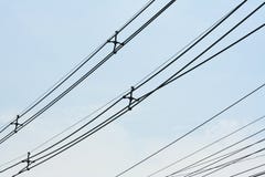 Low Voltage Power Cable and clear sky stock images Low Voltage Power Cable and clear sky stock images