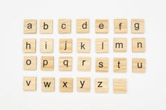 Lowercase alphabet letters on scrabble wooden blocks Royalty Free Stock Photography Lowercase alphabet letters on scrabble wooden blocks Royalty Free Stock Photography
