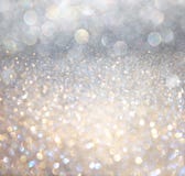Luci astratte bianche del bokeh dell'oro e dell'argento. fondo defocused fotografia stock libera da diritti Luci astratte bianche del bokeh dell'oro e dell'argento. fondo defocused fotografia stock libera da diritti