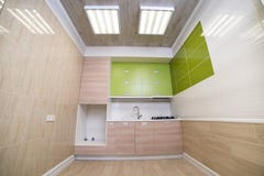 Luxurious laundry in the house with green cupboards, light parquet stock images Luxurious laundry in the house with green cupboards, light parquet stock images