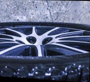 Lying wet car wheel stock images Lying wet car wheel stock images