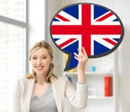 Lächelnde Frau mit Textblase der britischen Flagge lizenzfreies stockbild Lächelnde Frau mit Textblase der britischen Flagge lizenzfreies stockbild