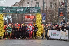 Läufer auf traditionellem Vilnius-Weihnachtsrennen stockfotografie Läufer auf traditionellem Vilnius-Weihnachtsrennen stockfotografie