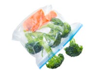 Légumes dans le sachet en plastique clair image stock Légumes dans le sachet en plastique clair image stock
