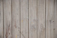 Líneas verticales pintadas envejecidas del fondo de madera gris fotografía de archivo libre de regalías Líneas verticales pintadas envejecidas del fondo de madera gris fotografía de archivo libre de regalías