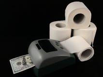 A machine for the production of dollars. Making dollars from toilet paper. Fake American money. Concept: fake dollars, money trash