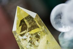 Macro shot of citrine stone and crystal balls on colorful background stock photo Macro shot of citrine stone and crystal balls on colorful background stock photo